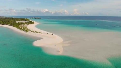 Drone flight over remote island in exotic maldives. Filmed in 4k 30p.