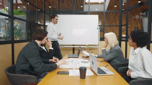 Business Team Meeting at Conference Table
