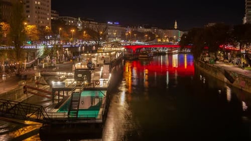 Tranquil River Flow and City Lights in Vienna Timelapse