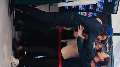 Crowd of Adults Pushing Near Storefront