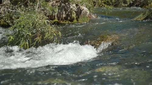 A beautiful small waterfall in the river.