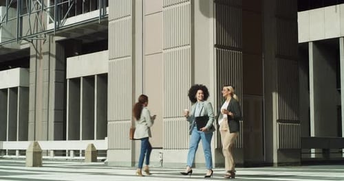 4k video footage of two business woman walking out of the office