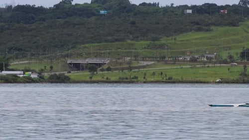 A rowing team sails on the lake.