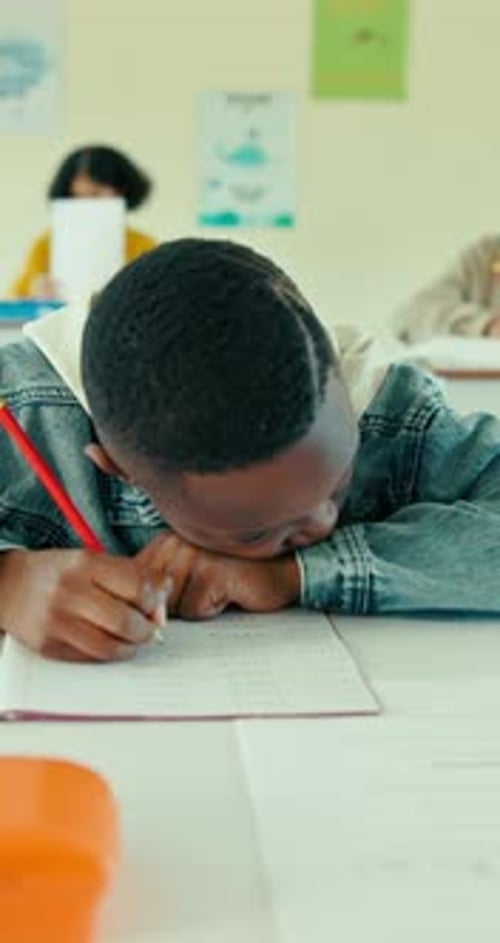 Sleeping, student and boy in classroom with fatigue from difficult math quiz
