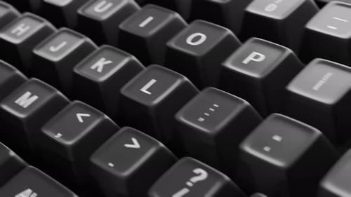 Sleek Computer Keyboard Focus on FAQ Key Animation