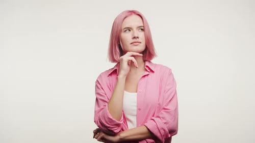 Young Woman with Pink Hair Thinking