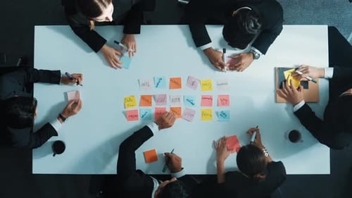 Top view of business team use sticky notes brainstorming idea. Directorate.