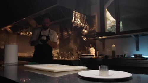 Chef is Preparing the Line at a Professional Restaurant Kitchen