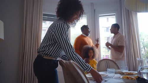 Family Preparing Meal Together at Home
