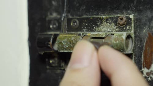 Close up of a sliding bolt latch on a door