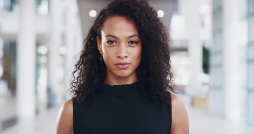 Smiling Young Adult Woman in Modern Office