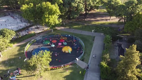 Children playing at Centenario park of Buenos Aires in Argentina. Aerial circling
