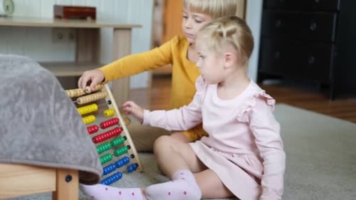 Playful Children Joyfully Engaging with a Colorful and Vibrant Abacus Filled with Joy and Learning