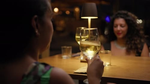 Woman Smelling The Wine In The Glass At The Restaurant
