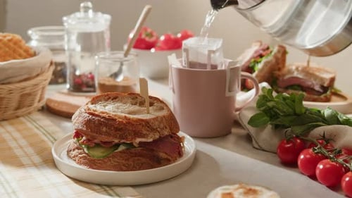 American Pastrami Sandwich with Ham Meet Cuts in Restaurant Cafe Kitchen Fresh Cucumber on Bread