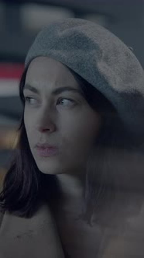 Woman Wearing Beret Looking Off Camera