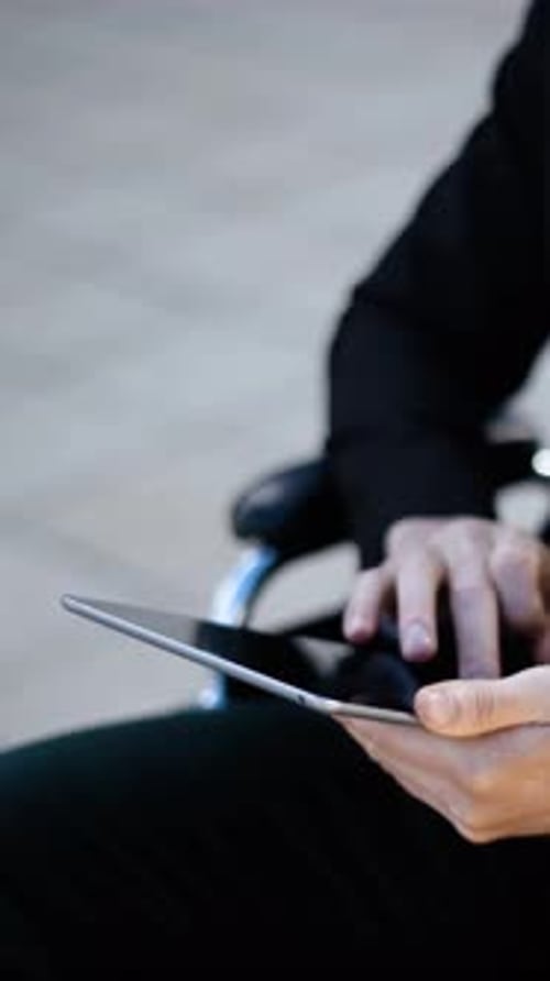 Man in Suit Using Tablet Device Outdoors