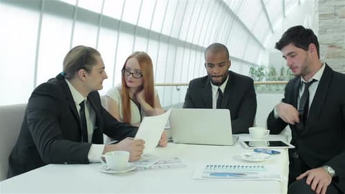 Businessman Discussing Documents