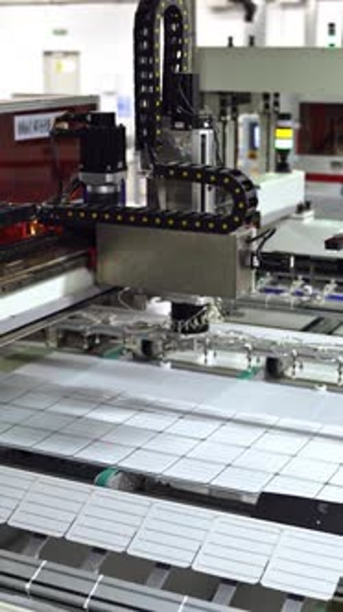 Modern automated solar energy production. Working factory mechanism of making solar cells.