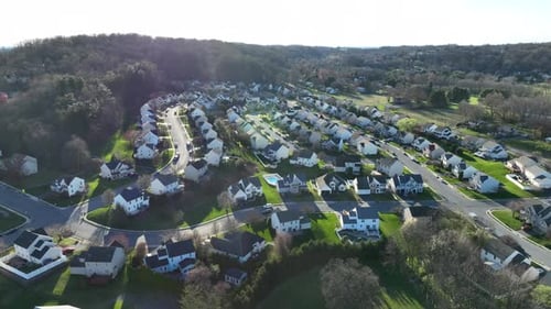 Modern new development homes and Buildings in american suburb at golden hour. Luxury apartments with