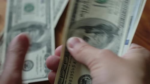 Close-up of Counting Money, Dollar Bills, Finance