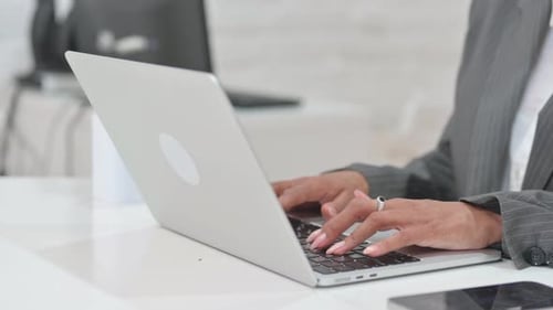 Close up of Woman Typing on Laptop