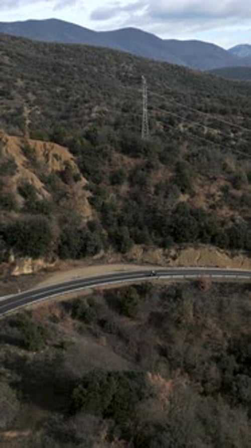 View From the Sky of a Road in a Forest
