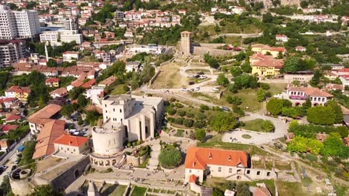 Kruje Castle and its fortress seen from an aerial drone view, tower and the Kruje museum with the mo