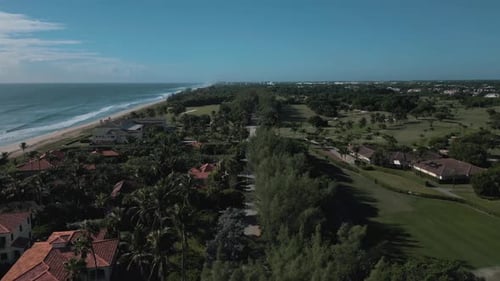 Drone view of highway along the pine trees and near beachside