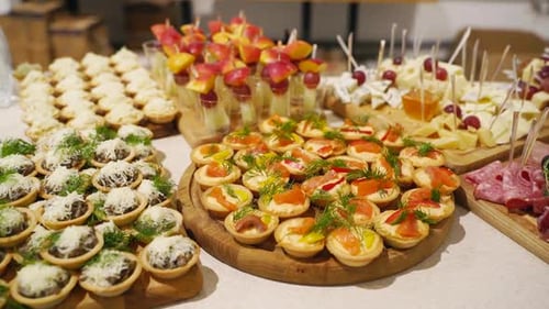 Catering Service on Banquet Table with Canape Snacks in Restaurant or Hotel Decorated Food Set on
