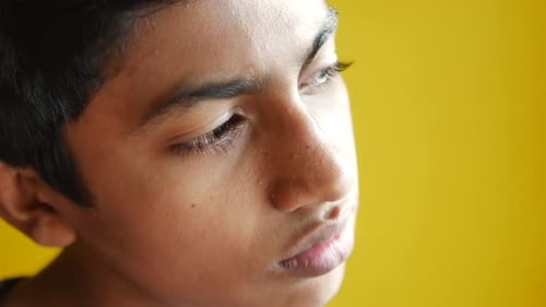 Sad Teenage Boy Face Looking Away