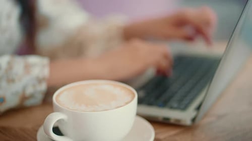 Woman Hands Working on Laptop Keyboard