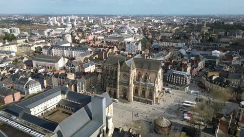 Basilica Saint-Aubin in Place Sainte Anne square and Jacobins convent, Rennes in France.Aerial tilt