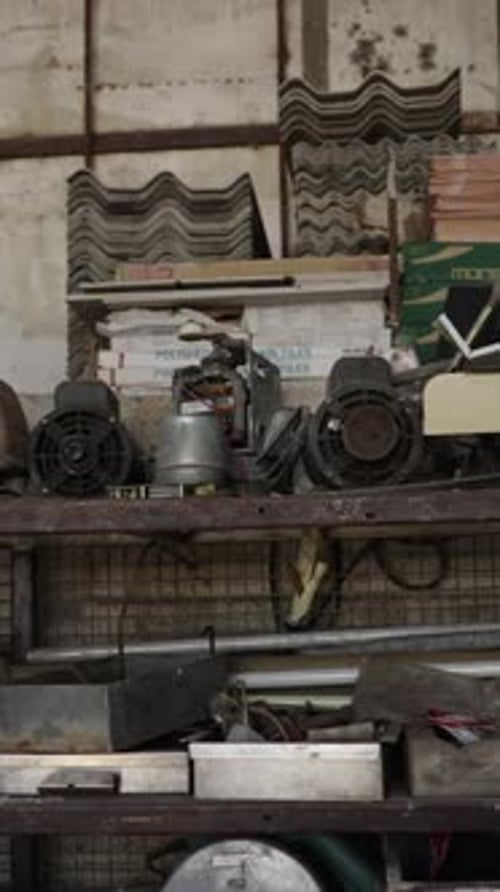 Traveling Shot of Unorganized Tools in a Factory FHD Vertical Video