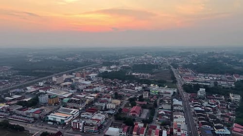 Sunrise Aerial View of Cityscape and Highway