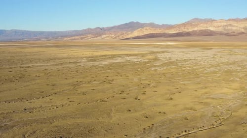 Aerial view over rough, rugged, hot and dry terrain of Death valley national park.