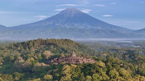Borobudur Indonesian buddhist temple with mount Sumbing behind