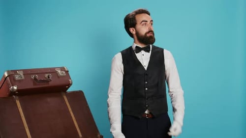 Classy Hotel Employee with Baggage
