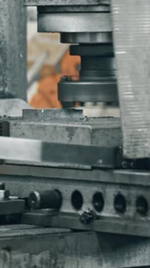 Dynamic metal cutting machine in factory action