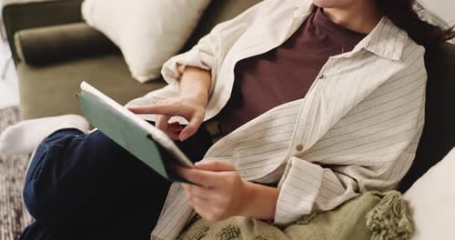 Hands, student and reading with tablet at house for research, education and university application