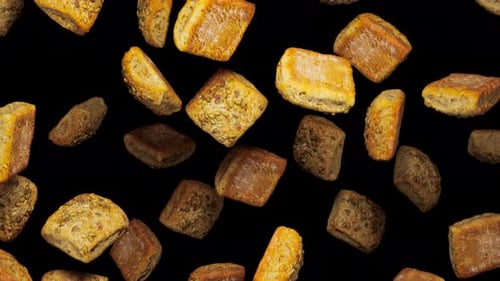 Falling Seeded Bread Rolls Seamless Loop Animation