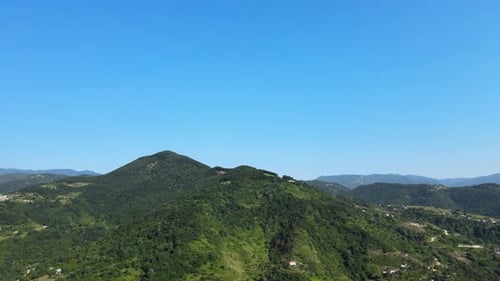 Scenic Aerial View of Lush Green Rolling Mountains
