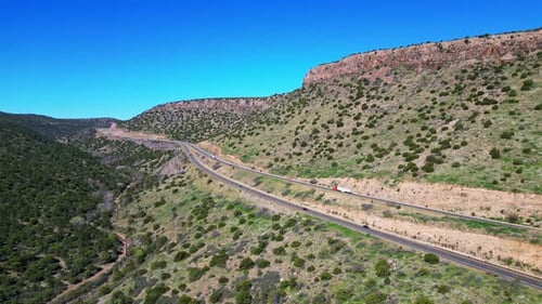 Aerial View of Winding Highway Through Arid Arizona Landscape