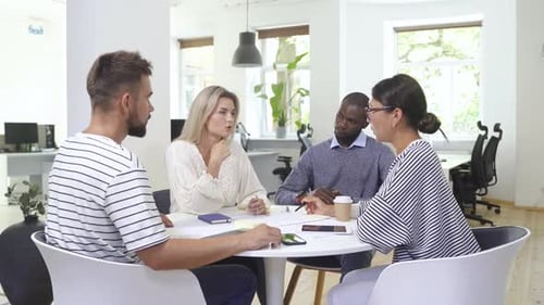 Collaborative Business Meeting in Modern Office