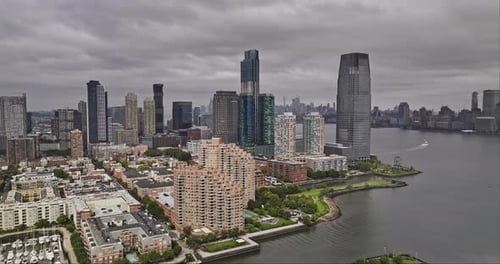 Jersey City New Jersey Aerial v26 flyover harbor capturing waterfront downtown cityscape and NYC Man