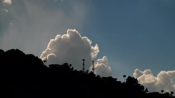 Cell Towers silhouette Timelapse with Exploding Clouds behind them ...