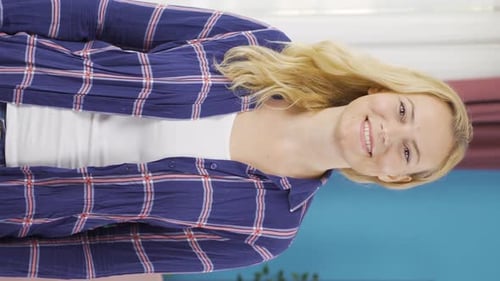 Smiling Woman Gives Thumbs Up and Claps