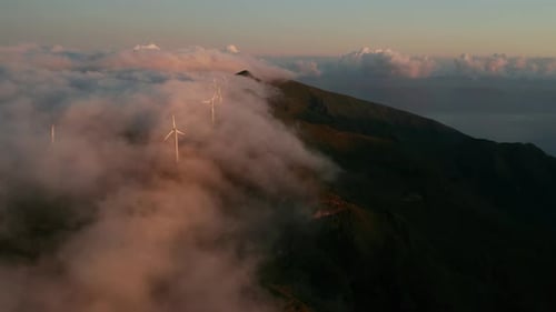 Wind Turbines on Mountain Ridge at Sunrise