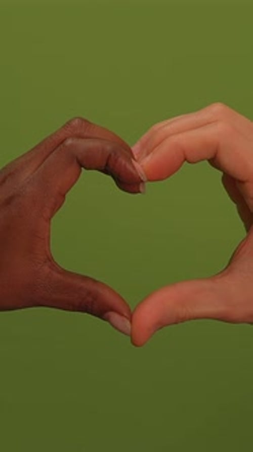 Unity Through Love Hands Coming Together to Form a Beautiful Heart Shape of Affection
