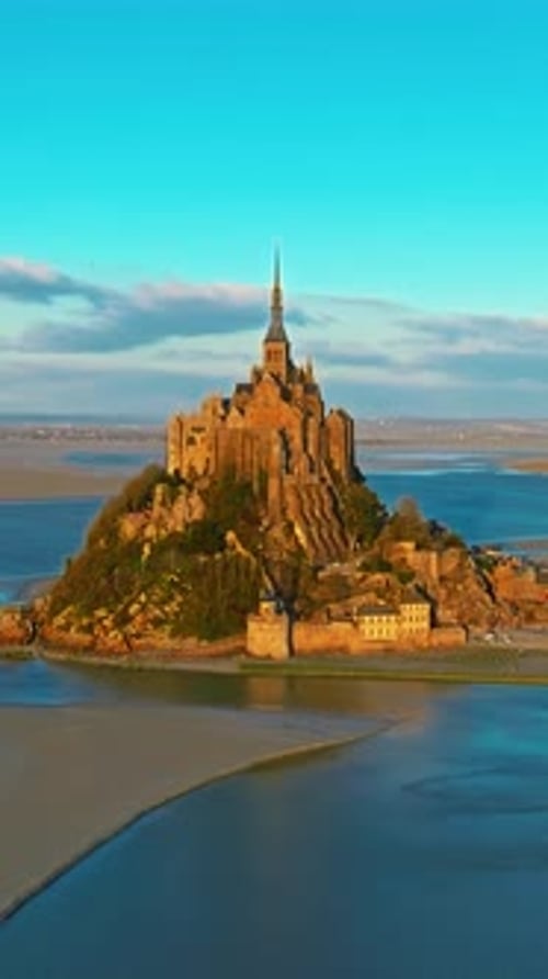 Aerial View of the Famous Historic Abbey Mont Saint Michel Historic Monastery with Tidal Flats